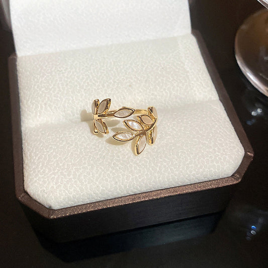 Elegant White Leaf Ring with Gold Base – Nature-Inspired Design